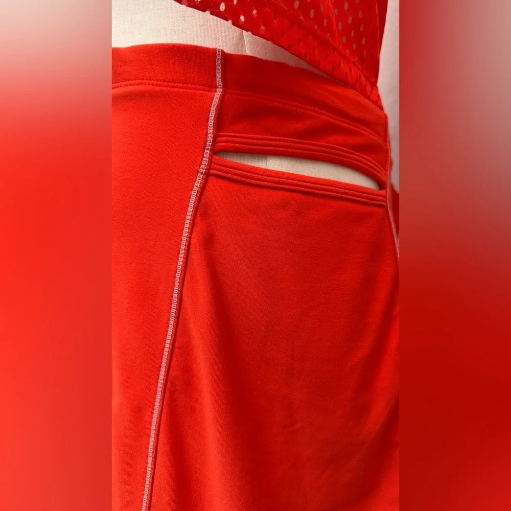Nike red athletic skort featuring built-in compression shorts Size M